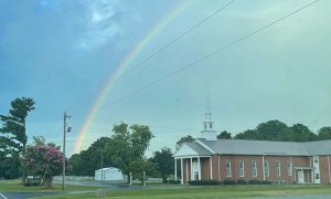 Rainbow in sky over Juniper Springs Baptist Church