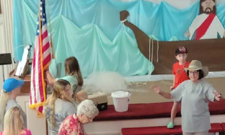 Church group fellowshipping at VBS assembly